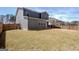 Large fenced backyard featuring a spacious lawn, perfect for outdoor activities and entertaining at 221 Caledonia Ct, Peachtree City, GA 30269