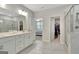 Spacious primary bathroom with double vanity, shower, and walk-in closet at 221 Caledonia Ct, Peachtree City, GA 30269