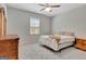 Cozy bedroom featuring neutral walls, soft carpet, and a window providing natural light at 221 Caledonia Ct, Peachtree City, GA 30269