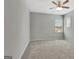 Bedroom with carpet, natural light, and a ceiling fan at 221 Caledonia Ct, Peachtree City, GA 30269
