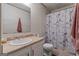 Bathroom features a vanity, a standard toilet and shower at 333 Old Carrollton Rd, Roopville, GA 30170