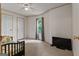 This bedroom has carpeted floors, two doors and a window for natural light at 333 Old Carrollton Rd, Roopville, GA 30170