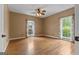 Bedroom with a ceiling fan and two windows at 333 Old Carrollton Rd, Roopville, GA 30170