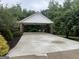 Carport with brick columns and space for parking at 333 Old Carrollton Rd, Roopville, GA 30170