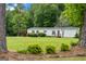 Charming manufactured home with mature trees and landscaping on a spacious lot at 333 Old Carrollton Rd, Roopville, GA 30170