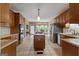 Kitchen with stainless steel appliances, a center island, and eat-in breakfast nook at 333 Old Carrollton Rd, Roopville, GA 30170