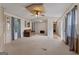 Bright living room includes carpet, built in storage, neutral paint, and window views at 333 Old Carrollton Rd, Roopville, GA 30170