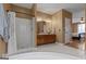 Main bathroom featuring double sinks, and a step in shower at 333 Old Carrollton Rd, Roopville, GA 30170
