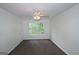 Bright bedroom with carpet floors and natural light at 5851 Giles Rd, Lithonia, GA 30058