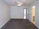 Spacious carpeted bedroom with closet and natural light at 5851 Giles Rd, Lithonia, GA 30058