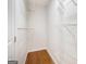 Walk-in closet offering ample storage with wire shelving and hardwood flooring at 2952 Diana Sw Dr, Atlanta, GA 30315