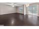 Open-concept living room with hardwood floors and sliding door access to backyard at 1360 Maple Valley Ct, Union City, GA 30291