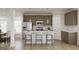 Stylish kitchen with stainless steel appliances, white countertops, and island with bar seating at 1205 Trombone Way # 3, Mcdonough, GA 30252