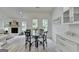 Dining area features a modern table with seating and stylish accents at 3336 Country Creek Nw Dr, Kennesaw, GA 30152