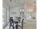 Bright dining area with a glass-top table and stylish decor at 3336 Country Creek Nw Dr, Kennesaw, GA 30152