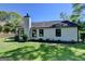 Exterior view of the home showing well-manicured lawn and newly painted siding at 3336 Country Creek Nw Dr, Kennesaw, GA 30152