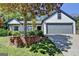 Charming home with white siding, dark trim, and a well-manicured front yard at 3336 Country Creek Nw Dr, Kennesaw, GA 30152
