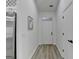 Bright hallway featuring modern flooring and neutral decor at 3336 Country Creek Nw Dr, Kennesaw, GA 30152