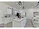Open-concept kitchen with granite counters, stainless steel appliances, and contemporary lighting at 3336 Country Creek Nw Dr, Kennesaw, GA 30152