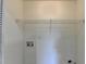 Utility room hookups and shelves for convenient laundry storage and organization at 3336 Country Creek Nw Dr, Kennesaw, GA 30152
