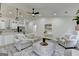 Open concept living area with modern kitchen and comfortable seating at 3336 Country Creek Nw Dr, Kennesaw, GA 30152