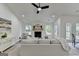 Bright living room boasts a fireplace with stone surround and cozy seating at 3336 Country Creek Nw Dr, Kennesaw, GA 30152