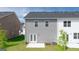 The backyard offers a patio and green space, perfect for outdoor living and entertaining at 100 Silver Moon Dr, Loganville, GA 30052