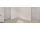 Bedroom featuring neutral carpet, white walls and a closet at 100 Silver Moon Dr, Loganville, GA 30052