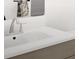 Sleek bathroom vanity with modern faucet and fixtures and bright countertops at 799 Grande Bishop Dr, Fairburn, GA 30213