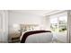 Cozy bedroom with a large window, neutral colors, and soft lighting at 799 Grande Bishop Dr, Fairburn, GA 30213