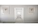Bright bedroom with a view to the ensuite bathroom and neutral decor at 799 Grande Bishop Dr, Fairburn, GA 30213