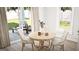Bright breakfast nook with access to the backyard patio, perfect for al fresco dining at 799 Grande Bishop Dr, Fairburn, GA 30213