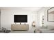 Bright and cozy living room with a sleek media console, toys, and access to other rooms at 799 Grande Bishop Dr, Fairburn, GA 30213