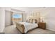 Luxurious bedroom with tray ceiling, large window, and plush carpeting at 322 Sound Cir # 118, Stockbridge, GA 30281