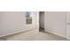Neutral bedroom features carpet and a window with natural light at 322 Sound Cir # 118, Stockbridge, GA 30281
