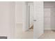 Bedroom view with walk in closet and neutral carpeting at 322 Sound Cir # 118, Stockbridge, GA 30281