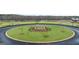 Beautifully landscaped roundabout with stone fountain adds charm to this new community at 322 Sound Cir # 118, Stockbridge, GA 30281