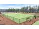 Fenced community dog park with benches, trash receptacles and lush green grass, ideal for pet owners at 322 Sound Cir # 118, Stockbridge, GA 30281