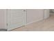 Hallway with neutral carpet and white doors with trim at 322 Sound Cir # 118, Stockbridge, GA 30281