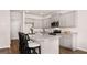Spacious kitchen equipped with granite countertops, stainless steel appliances, and ample cabinet space at 322 Sound Cir # 118, Stockbridge, GA 30281
