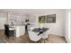 Open kitchen and dining area with breakfast bar and plenty of seating at 322 Sound Cir # 118, Stockbridge, GA 30281