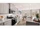 Well-equipped kitchen with modern appliances, granite countertops, and easy access to the dining area at 322 Sound Cir # 118, Stockbridge, GA 30281