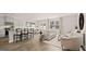 Open-concept living space with a kitchen, dining area, and cozy seating at 322 Sound Cir # 118, Stockbridge, GA 30281