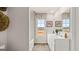 Bright bathroom features a double sink vanity with modern fixtures, and a window for natural light at 326 Sound Cir # 119, Stockbridge, GA 30281