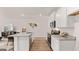 Contemporary kitchen with stainless steel appliances, granite countertops, an island, and modern decor at 326 Sound Cir # 119, Stockbridge, GA 30281
