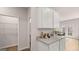 Granite counters accent the kitchen with a walk-in pantry on the side at 326 Sound Cir # 119, Stockbridge, GA 30281