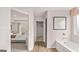 Bathroom featuring a soaking tub with views to the main bedroom at 326 Sound Cir # 119, Stockbridge, GA 30281