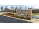 Entrance to Echo Glen community with stone signage and landscaped surroundings at 326 Sound Cir # 119, Stockbridge, GA 30281