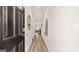 Entryway hallway with wood flooring and access to the living area at 326 Sound Cir # 119, Stockbridge, GA 30281