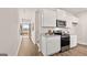 Kitchen featuring white cabinets and stainless steel appliances at 326 Sound Cir # 119, Stockbridge, GA 30281